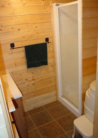inside the bathroom of the Madrona cabin kit made by bavariancottages.com